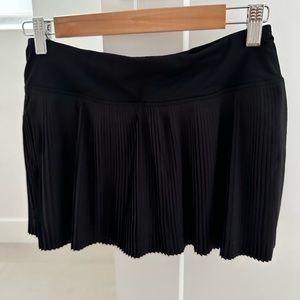 Lululemon tennis skirt with short under in black size 4